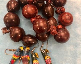 Item 445:  Bag 21: Two Wood Bead Bracelets and Two Pair of Parrot Earrings: $16