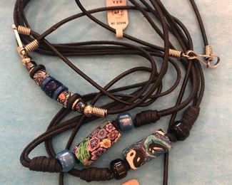 Item 430:  Bag 6: Assorted Clay and Black Cord Jewelry: $10