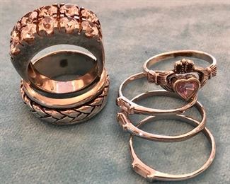 Item 422:  Sterling and Cz Ring: $45                                                         Item 423:  Sterling Claddagh Ring with Amethyst Stone:  $35                                                                                       
Item 424:  Heavy Mexican Sterling Ring: $48                                         Item 425:  Stack of (3) Sterling and Stone Rings: $24       