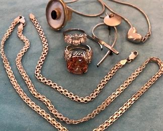 Item 411:  Sterling Necklace and Bracelet Set: $48 (SOLD)                                                                                                    Item 412:  Sterling Ring with Gold Overlay and Black Center Stone: $50                                                                                                             Item 413:  Sterling Silver Ring with Orange Stone: $48                      Item 414:  Sterling Silver Ring with 3 Stones: $48                               Item 415:  Sterling Silver Bird Pin: $18                                                         Item 416:  Sterling Silver Heart Necklace: $30