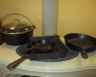 Cast iron. Wagner dutch oven, Griswold small round pan & large square pan. No name round pan. 