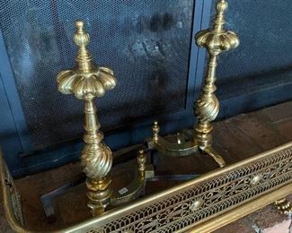 Antique brass andirons and fireplace
grille