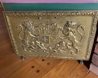 Antique brass log holder