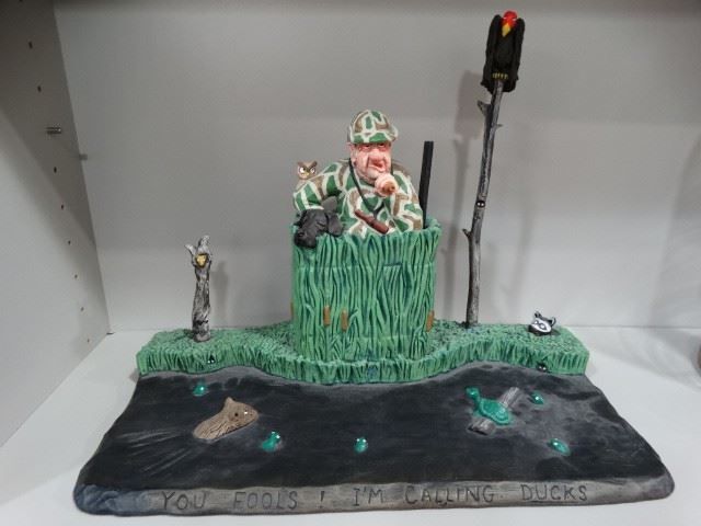 "You Fools!  I Am Calling Ducks" by Gene Zesch  -Bronze painted sculpture