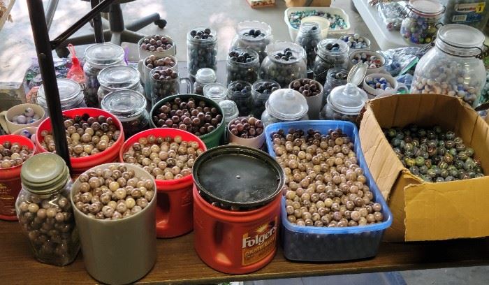 We have tables that are completely packed with marbles. All sizes, all kinds. We even have tables stacked on top of tables to showcase this marble collection. These two pics (this one and the one to follow) are only a smidgen of what you will find in this sale.