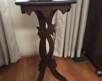 Antique plant stand  was a gift to my grandmother in the early 1900s. I’ve been told it was hand carved from one tree trunk.  One of a kind!