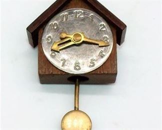 Lot 074
Wood clock brooch pin