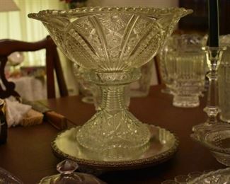 Beautiful EPAG Punch Bowl with Bullseye Design sitting atop a Mirrored Antique Silver-plate Display with Footed design and Filigree edging