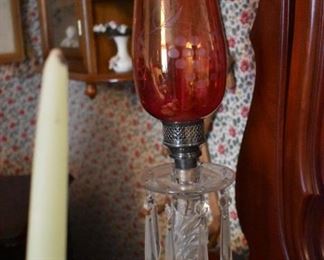 Beautiful pair of Antique Candle Lamps featuring Cranberry Glass Globes, Crystal Prisms and highlighted by Lalique 
 Style Art Nouveau Bases