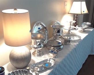 Lots of serving pieces. Silverplate champagne coolers, trays, candlesticks, compotes, casseroles