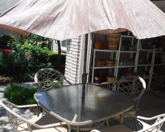 Hampton Bay patio set (table, 4 chairs with cushions, umbrella with base and cover).