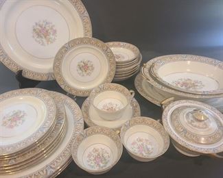 Set of Noritake Claire china, there are four dinner plates measuring 10", Four salad plates measure 7", Four dessert plates measure 6". There are three tea cups with plates, Four soup bowls measure 6", Four small bowls measure 5", Also includes sugar and creamer dish (creamer has a small chip on it) Two serving bowls and a platter. https://ctbids.com/#!/description/share/953492