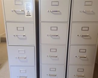 Two HON filing cabinets and one office image filing cabinet. Each one has four filing drawers and measure 15" x 27" x 52". https://ctbids.com/#!/description/share/953384