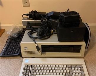 This is an original IBM 5150 Personal computer and keyboard. There is another modern usb keyboard as well as some docking stations for laptops by Dell and HP and also some generic speakers and a Belkin router too. https://ctbids.com/#!/description/share/953392