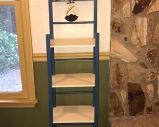 Very cute lighthouse themed shelf with a wooden pelican roosting on top. Shelf measures 10” x 13” x 59”.  https://ctbids.com/#!/description/share/953512