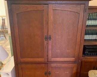 Oak TV entertainment armoire with two pull out shelves at the bottom of it. The cabinet is sturdy and has minimal signs of wear on it. The top doors retract inside the cabinet for TV viewing. 49x25x62 Inside cabinet: 38x30 for TV fit https://ctbids.com/#!/description/share/953521