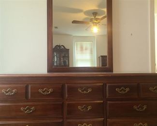 Beautiful Thomasville dresser with mirror that can be detached.  Dresser  has nine total drawers, the middle ones have a look of being two separate drawers but its one. Dresser measures 62" x 20" x 32"(top of dresser) 81" (from floor to top of mirror). https://ctbids.com/#!/description/share/953564