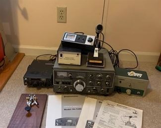 These are Kenwood FM transceivers. There is also some other communication gear like a mic and signal tester as well as a Morse code device. https://ctbids.com/#!/description/share/953391