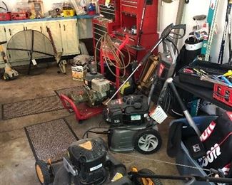 Lawnmower; Tennis Rackets; Craftsman rolling tool cabinets; skis; assorted tools; weed eater; power washers