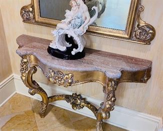 $800 SET
HALLWAY HALF-MOON MARBLE TOP WOOD GOLD TABLE WITH GRAPES
46”L x 15”D x 29”H 
ORNATE FLORAL GOLD MIRROR 
66”L x 41.5”W