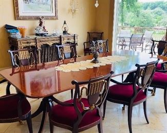 $4,000
BAKER FURNITURE HISTORIC CHARLESTON REPRODUCTIONS DINING TABLE WITH 10 WILLIAM SWITZER FINE UPHOLSTERED CHAIRS 
TABLE WITH 2 LEAVES MEASURES
108”L x 46”W x 29.5”H 
EACH LEAF MEASURES 20”L x 46”W
CHAIR MEASURES
23.5”W x 21.5”D x 38”H
