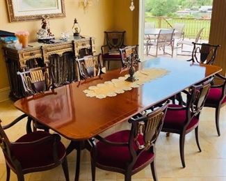 $4,000
BAKER FURNITURE HISTORIC CHARLESTON REPRODUCTIONS DINING TABLE WITH 10 WILLIAM SWITZER FINE UPHOLSTERED CHAIRS 
TABLE WITH 2 LEAVES MEASURES
108”L x 46”W x 29.5”H 
EACH LEAF MEASURES 20”L x 46”W
CHAIR MEASURES
23.5”W x 21.5”D x 38”H
