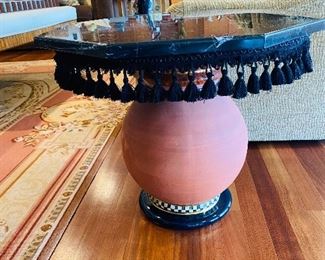 $375
MACKENZIE CHILDS ROUND TABLE WITH TASSELS 
SOLD AS IS
( CRACK IN GRANITE)
24”L x 24”W x 19”H
