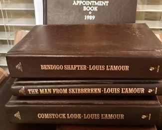 Huge Louis L'Amour Collection of Leatherette covered books. Come see.