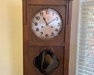 #38	antique clock  you can hang it key is inside 11x6.5x25.5	 $75.00 
