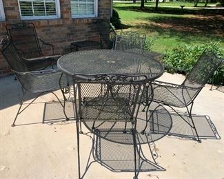 #42	round table with 4 chairs 48 round x29	 $125.00 
