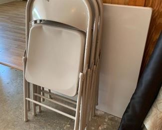#61	folding card table with 4 chairs 	 $30.00 
