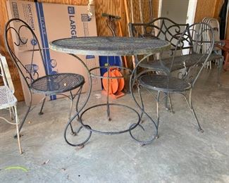 #64	metal bistro table 2 chairs  30x 29	 $75.00 
