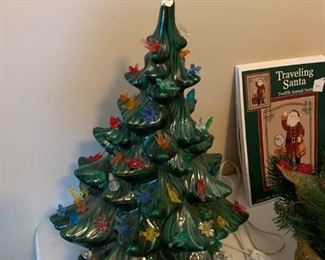 #137	as is ceramic christmas tree with bird lights chip on top 	 $25.00 

