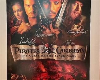 “Pirates of the Caribbean, The Curse of the Black Pearl” framed movie poster, signed by Johnny Depp, Keira Knightly, Geoffrey Rush, Orlando Bloom and Jonathan Pryce