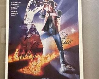 “Back to the Future” framed movie poster, signed by Michael J. Fox,  Steven Spielberg, Christopher Lloyd, Crispin Glover, Lea Thompson
