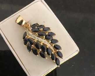 14k pendant with diamonds and Sapphire