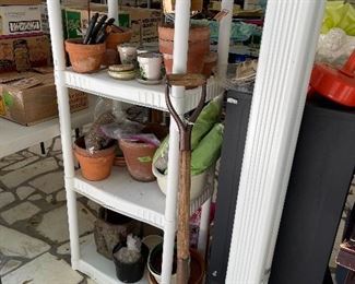 Planters/pots, pruning shears, gloves, copper stakes to identify plants, pitchfork 