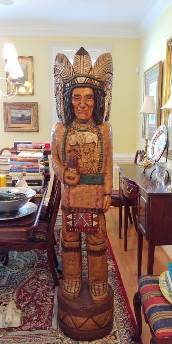 Wood figures such as this were first created when the Native Americans introduced the English settlers to tobacco in the 1600s. Shop owners would put them outside their stores to let people know that they sold tobacco inside. Fast forward now to the 1840s and a Native American Indian from the Man-Dan tribe started making furniture and carving his own similar sculptures. Following the tradition of many (Indian) laborers of the time, this Native American took his employer’s surname and became known as “Samuel Gallagher”. And so, the “Gallaghers” and a long line of master craftsman were born! From Samuel, through Ralph (who sadly passed away aged 74 in 2000) and all the way to Frank & John today, the Gallaghers have become synonymous with fine Native American carving. Their pieces from the 1840s are virtually priceless (- indeed one of the original Gallagher sculpture’s is on display at the Smithsonian Institute –) but the more modern sculptures also remain most desirable. Today’s pieces 