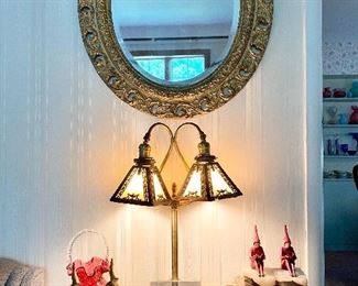Living room antique oval mirror, very unusual two arm antique lamp & J.B.Hirch pixie bookends.