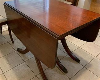 Duncan Phyfe drop leaf dining table with pads