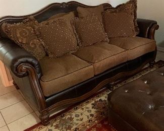 wood and leather sofa, Ashley furniture
