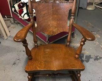 Nice Oak Arts and Crafts era pressed back rocking chair