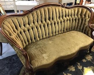Beautiful Victorian carved and velvet tufted sofa.  Excellent condition.