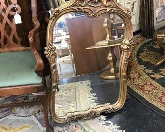 Another nice gold mirror.  Elegant frame