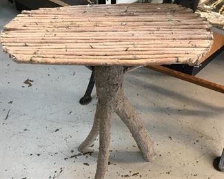 Love this twig table.  Found the wood on their farm and made a table.