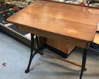 Love this oak student desk with Iron base, 2 ink wells, opens up for books and papers and pencil tray. Excellent condition.