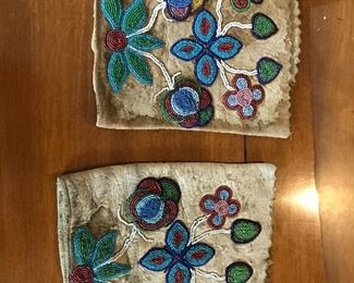 Native American Leather with beaded design. Pair of Leather Cuffs circa 1900's. 6"X7"