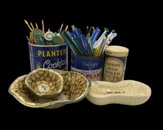 This lot contains peanut themed memorabilia that includes a vintage Planter's can, Adam's Mixed Nuts and Kroger's nuts. Planter's 2 piece bowl, Went Nuts ceramic peanut shaped dish and Life Insurance of Georgia drink stirrers. Mr.Peanut Dishes measures (Main 6” x 2”) (Smalls 3” x 1”). https://ctbids.com/#!/description/share/955284