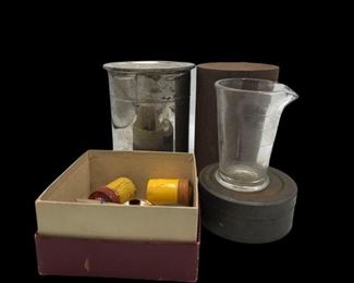 This lot contains a vintage film items that include. a silver film tank, metal film tank, slides and some old Kodak Film rolls. Measurements: Silver Film Tank- 5” x 6” Metal Film Tank- 4” x 6” https://ctbids.com/#!/description/share/955283