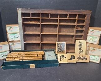 The vintage type set has all letters numbers and symbols except for the "J". Six boxes of vintage 20's to 30's buttons. Very beautiful pearlescent buttons each container has twelve sets of buttons. Small collectible holding shelf measures 17" x 1 1/2" x 11 1/2" and rubber stamps with ink pad. https://ctbids.com/#!/description/share/955282
